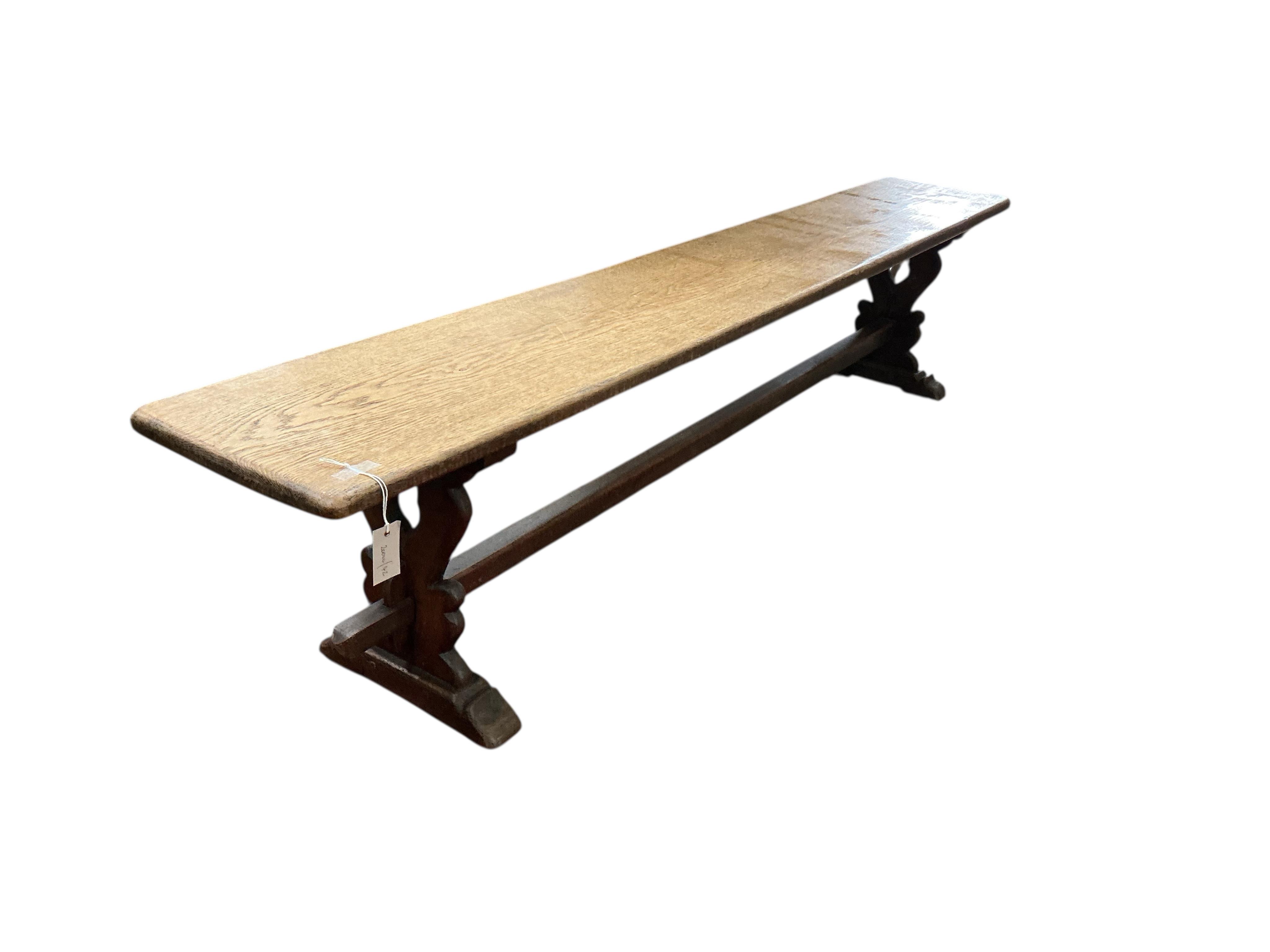An 18th century style rectangular oak bench seat, width 220cm, depth 34cm, height 47cm